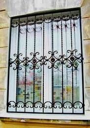 wrought iron doors and windows and panels